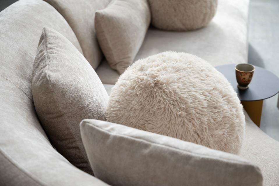 ITZA CHAISE FACING RIGHT SECTIONAL DARK CREAM WITH SOFT CREAM SQUARE PILLOWS AND ANGORA BALL PILLOWS FABRIC 3-PIECE